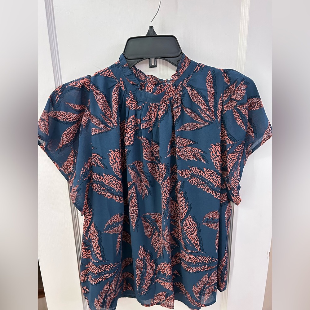 THML women’s blue high neck blouse. Size small.